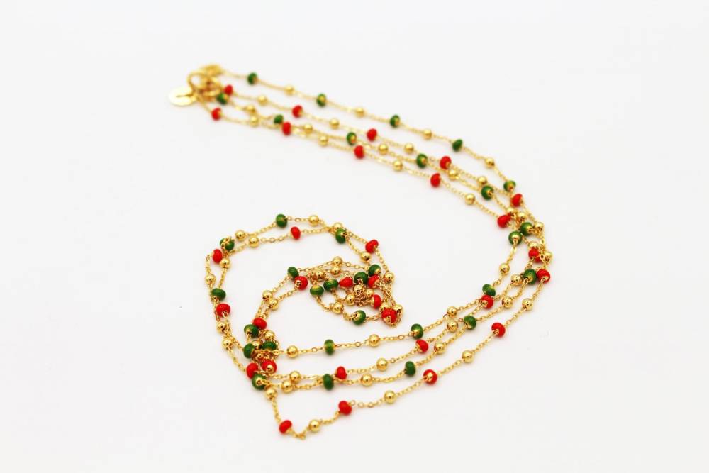Collier or jaune, émail et boules