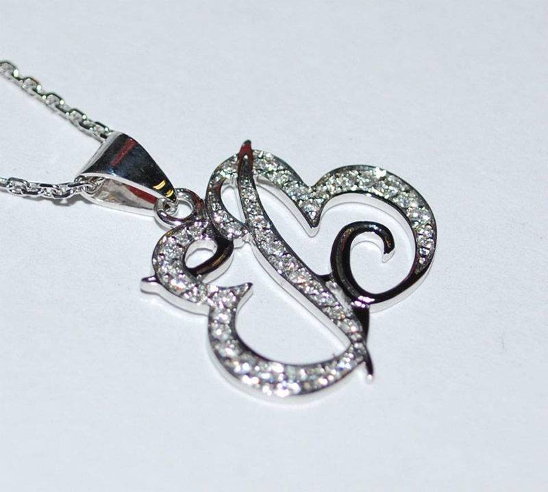 Pendentif or blanc et diamants, initiales EB