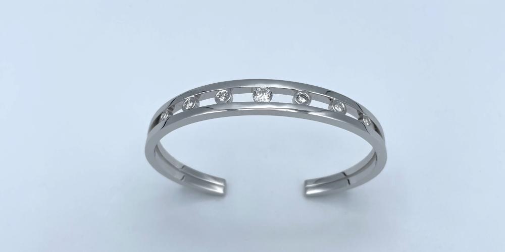 Jonc esclave or blanc et diamants en chute