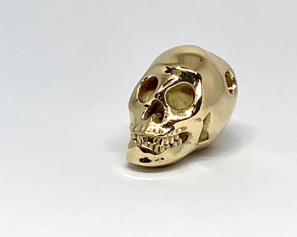 Pendentif or jaune crâne