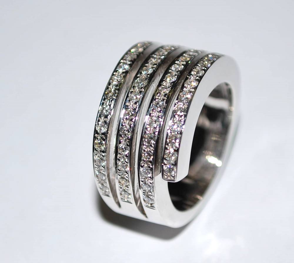 Bague or blanc spirale diamants, serti grain